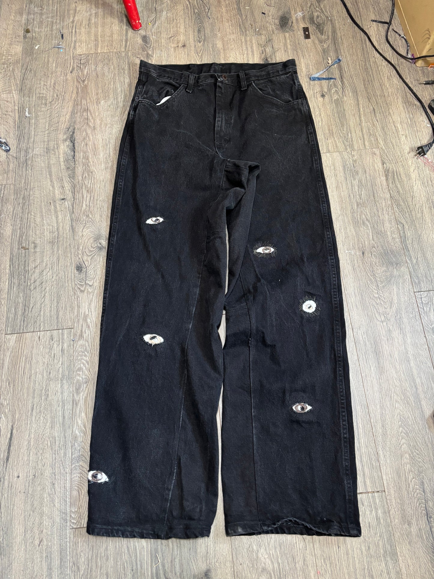 1 of 1 Black Eye denim pants.