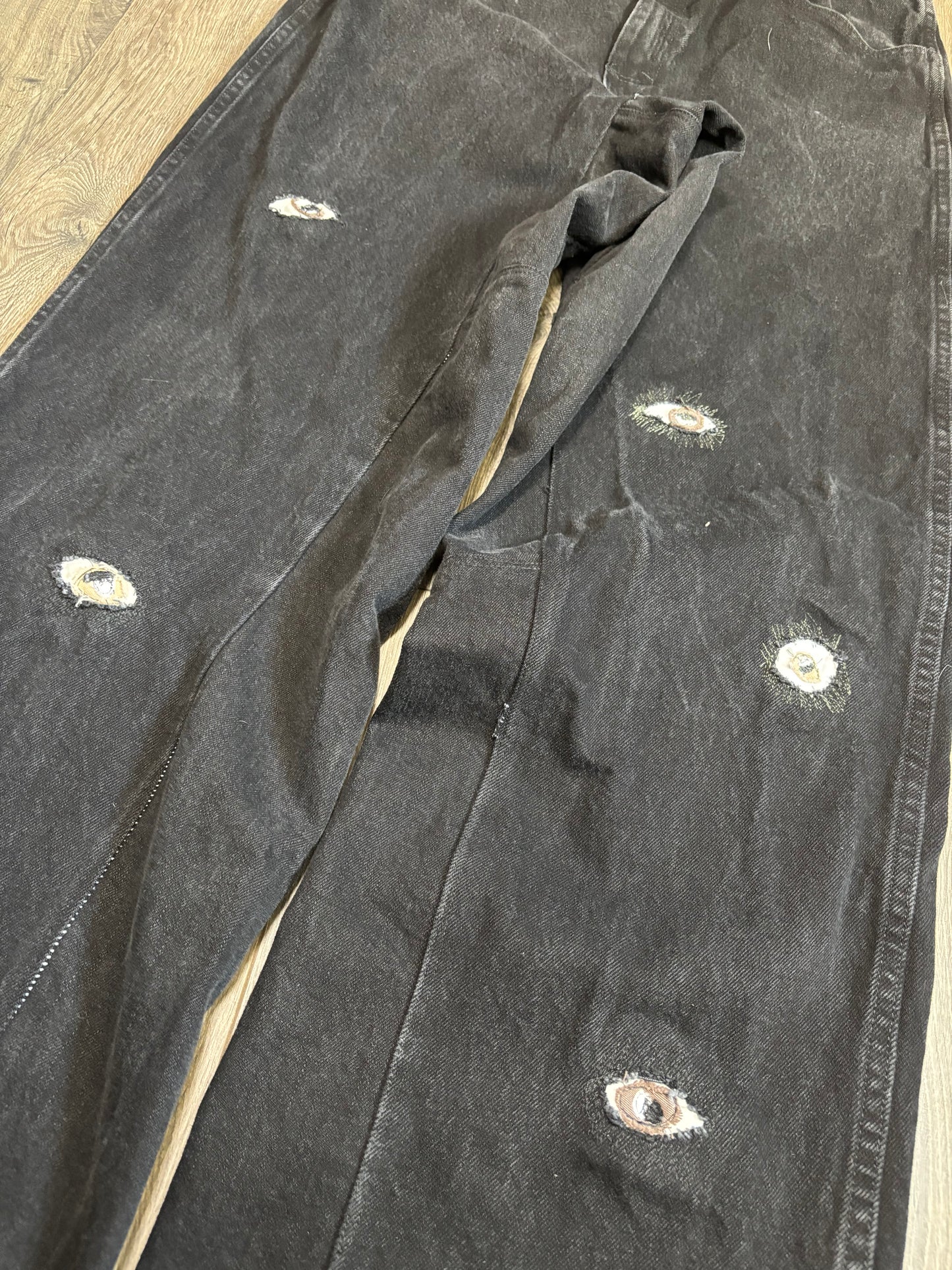 1 of 1 Black Eye denim pants.