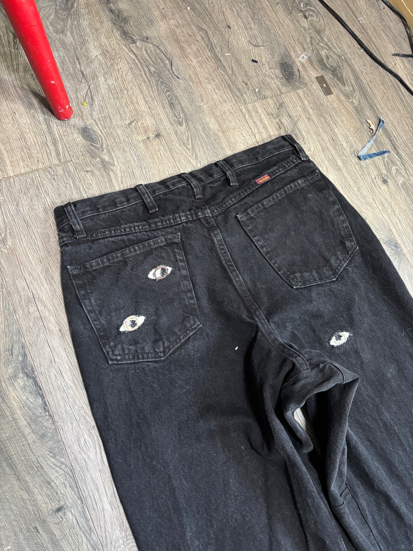 1 of 1 Black Eye denim pants.